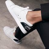 CHRISTIAN LOUBOUTIN white and black calfskin sneakers
